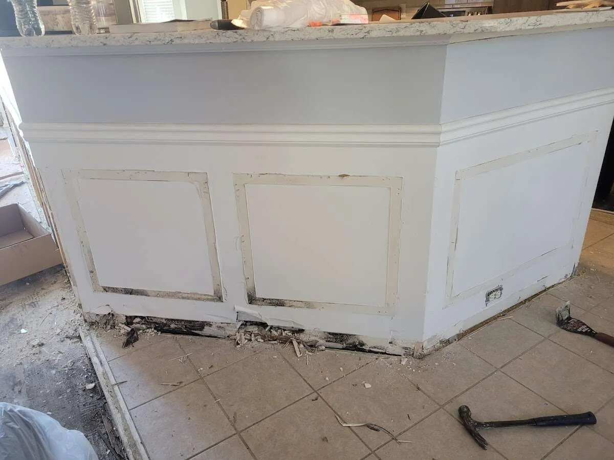 Water damage and mold on kitchen during Sewage Cleanup & Sanitation in Sandusky